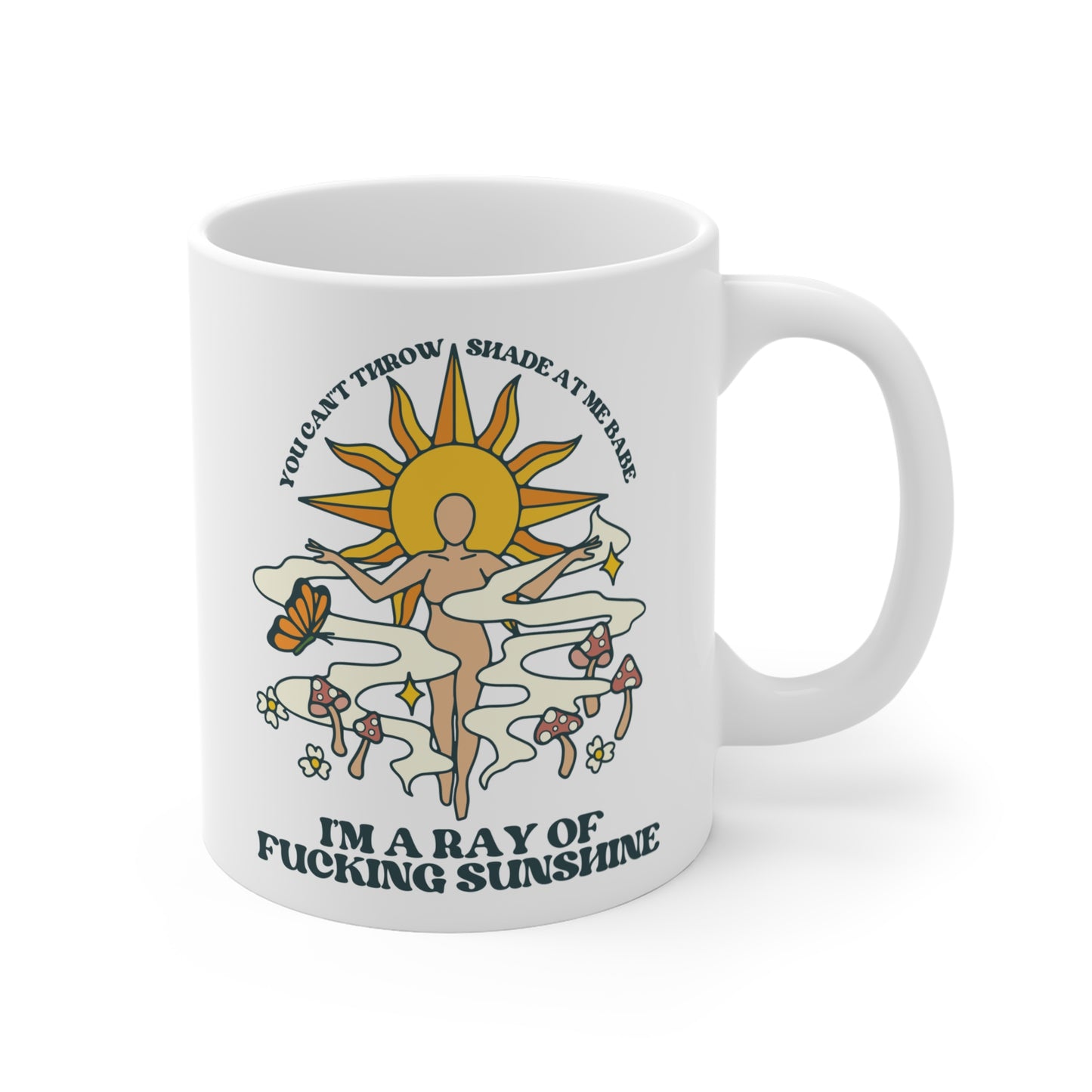 A white ceramic mug that says You Can't Throw Shade At Me, I'm a Ray of Fucking Sunshine.