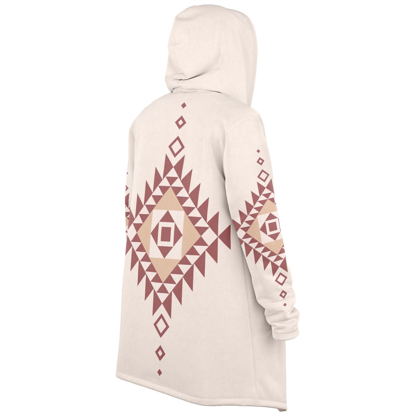A cozy, hooded, beige microfleece cloak with a pink and tan Southwestern diamond shaped design on the back and elbows.