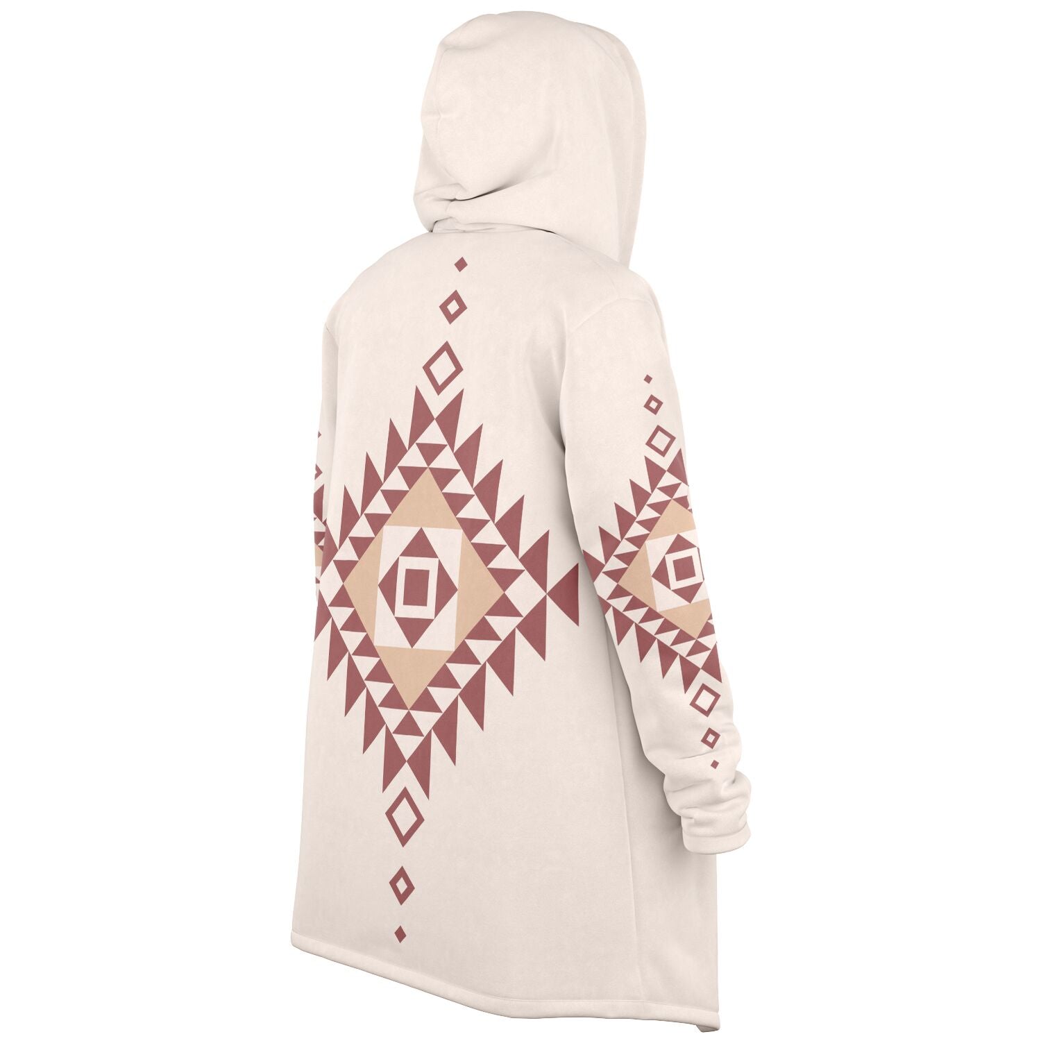 A cozy, hooded, beige microfleece cloak with a pink and tan Southwestern diamond shaped design on the back and elbows.