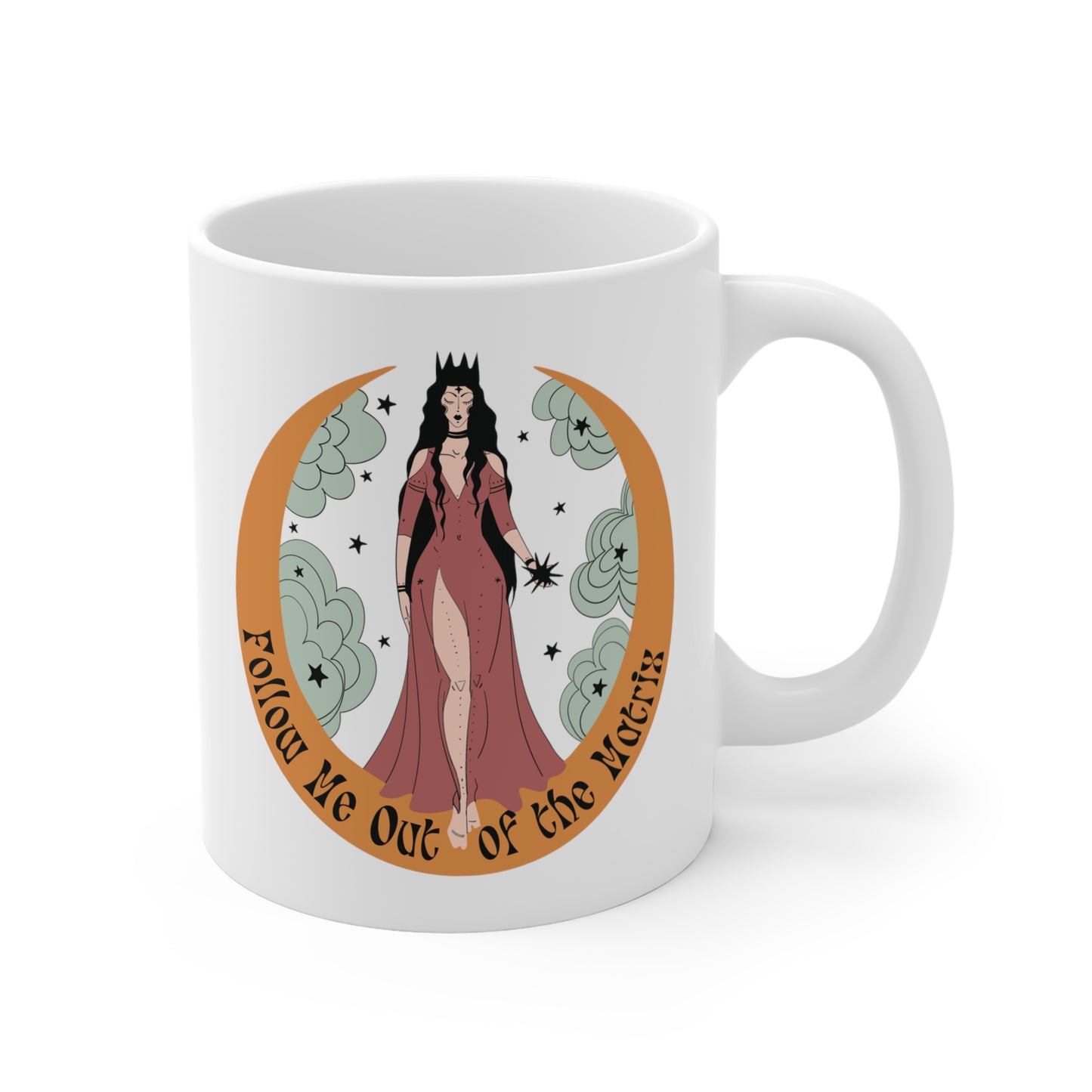 A white ceramic mug that says Follow Me Out Of The Matrix.