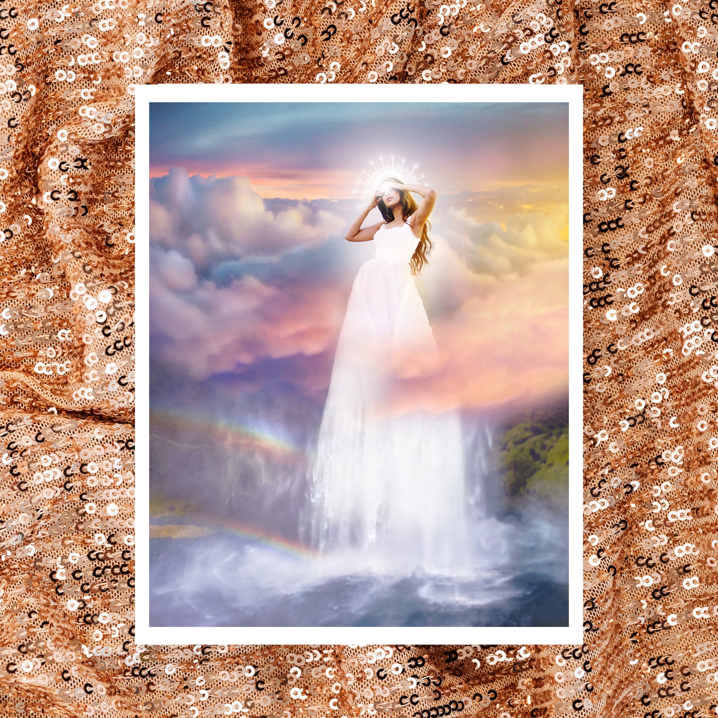Woman in a white dress standing on a waterfall with a colorful sky and rainbow in the background.