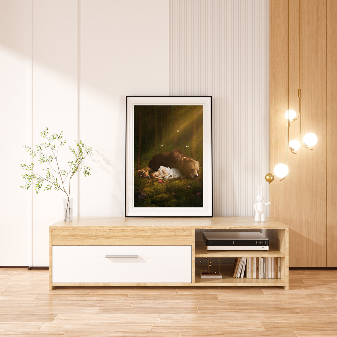 A magical scene of a young girl sleeping on the forest floor with a bear and a fox.