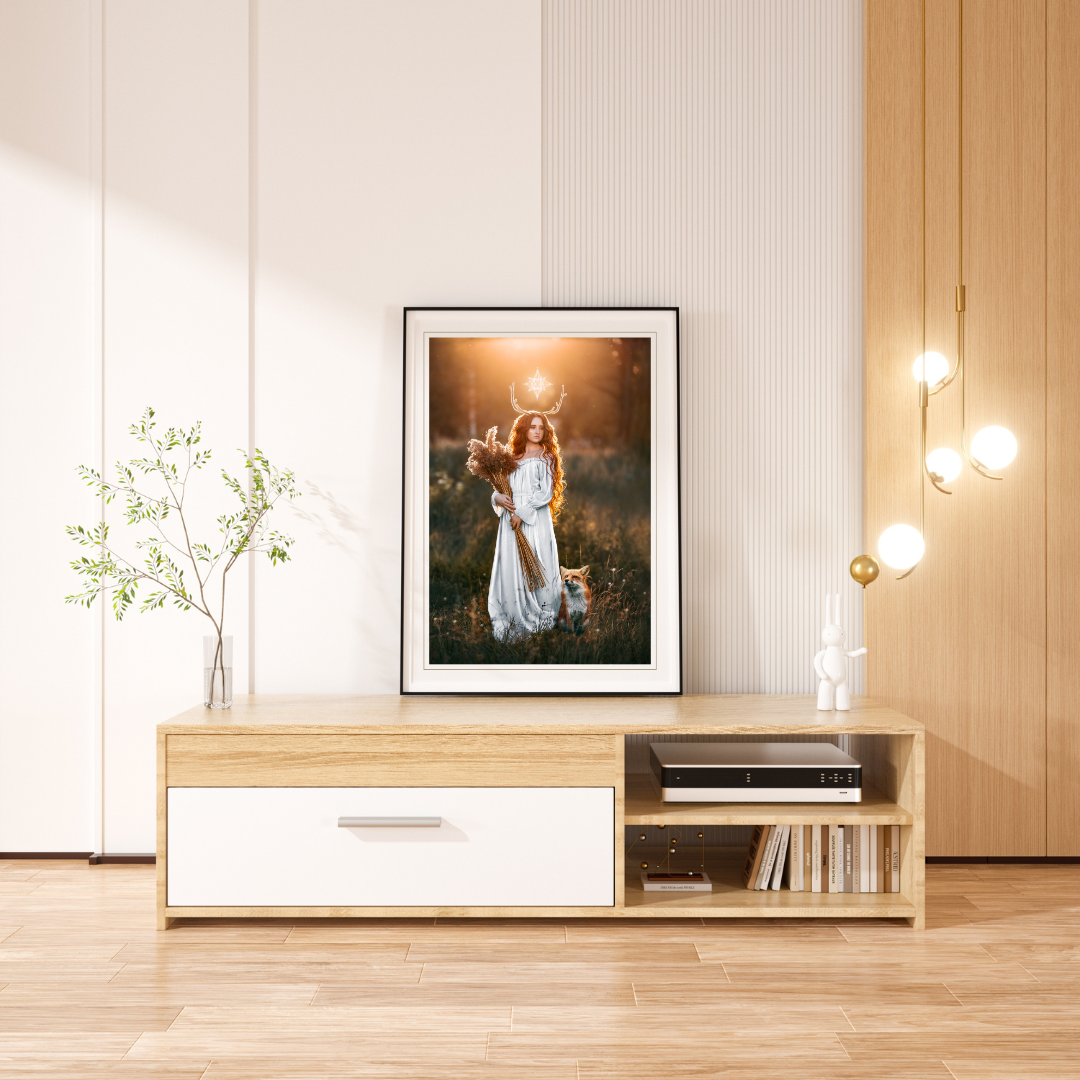 Woman in a white dress with a fox in a field at sunset.