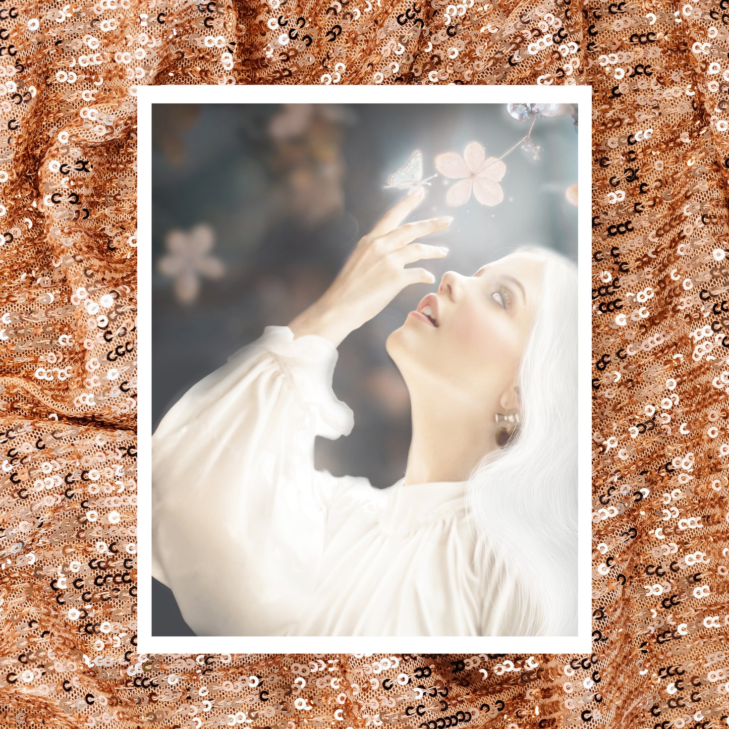 Woman in white reaching towards flowers with a glowing butterfly on her finger.